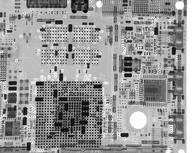 Middle-right of upper side of the circuit board