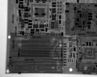 Lower-left of lower side of the circuit board