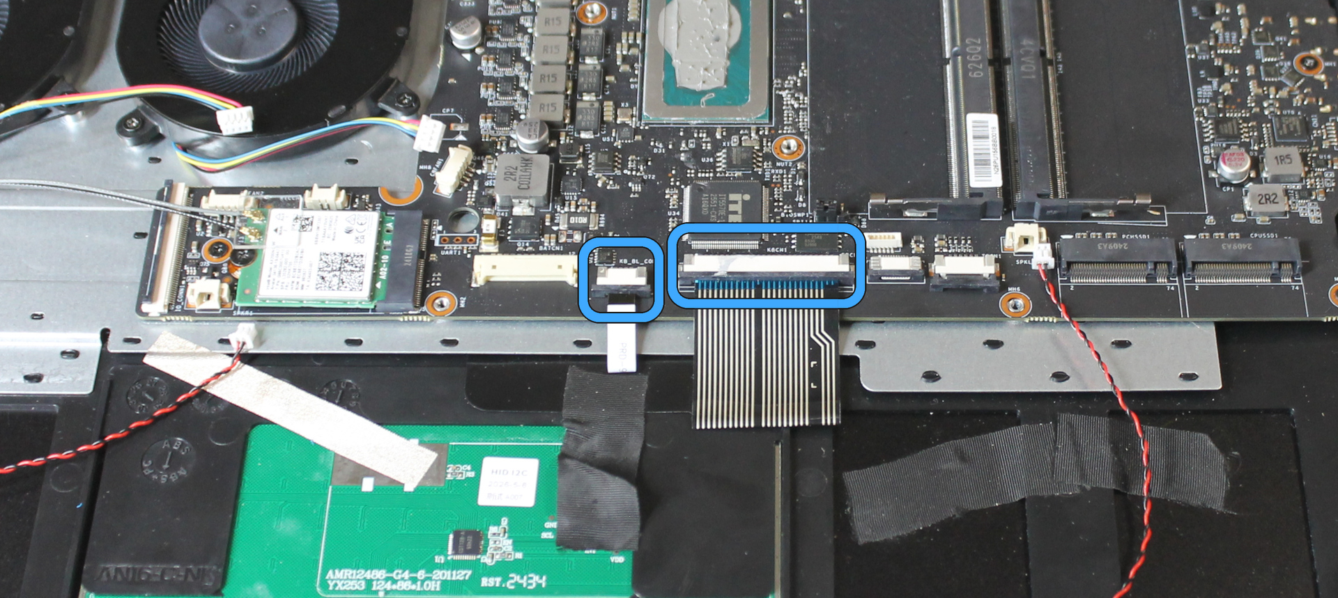 Mainboard with flat connectors marked for removal