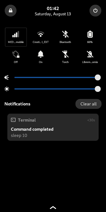 A missed notification for Clocks displayed below the settings panel